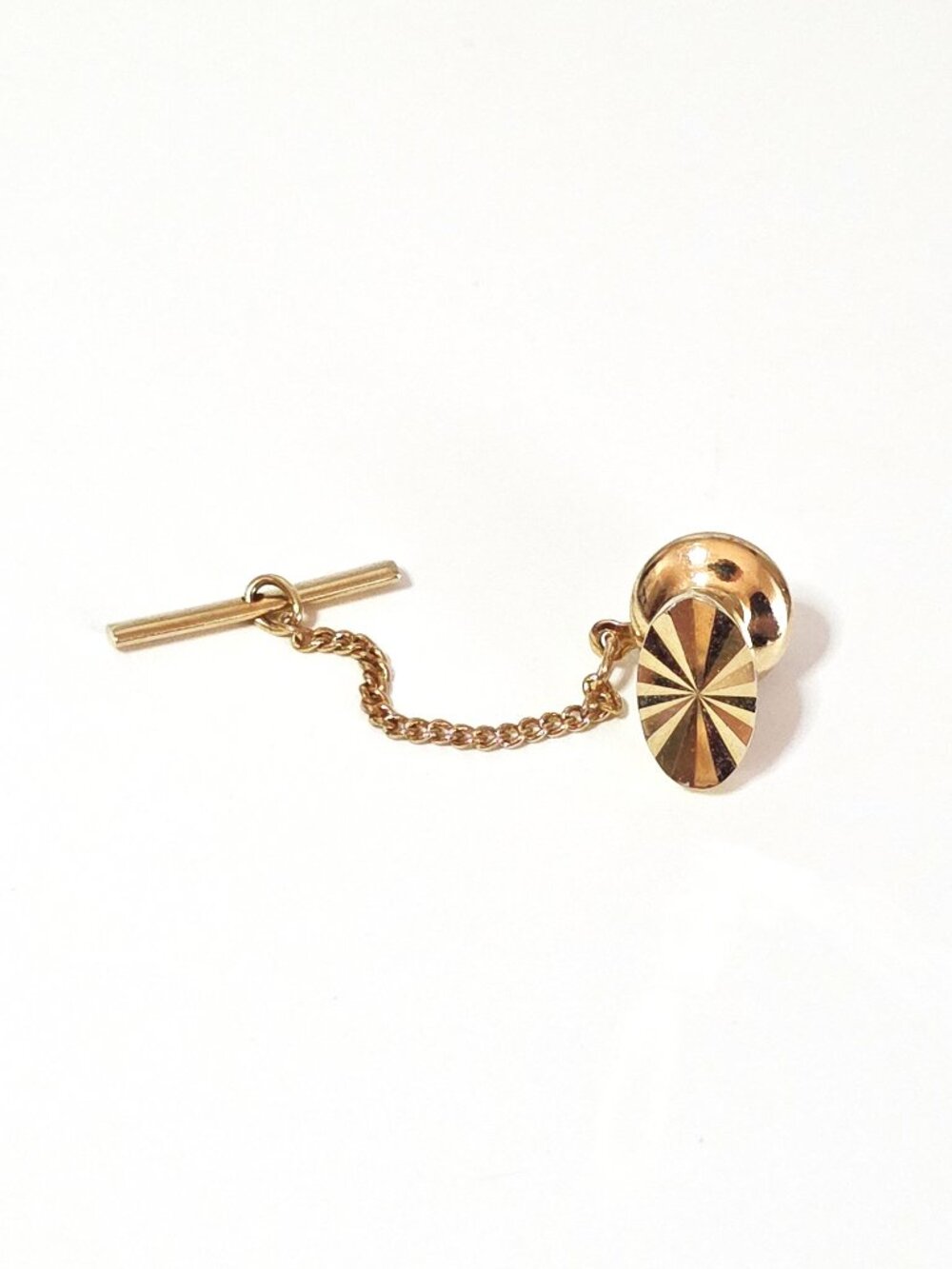 Gold tone diamond cut tie pin